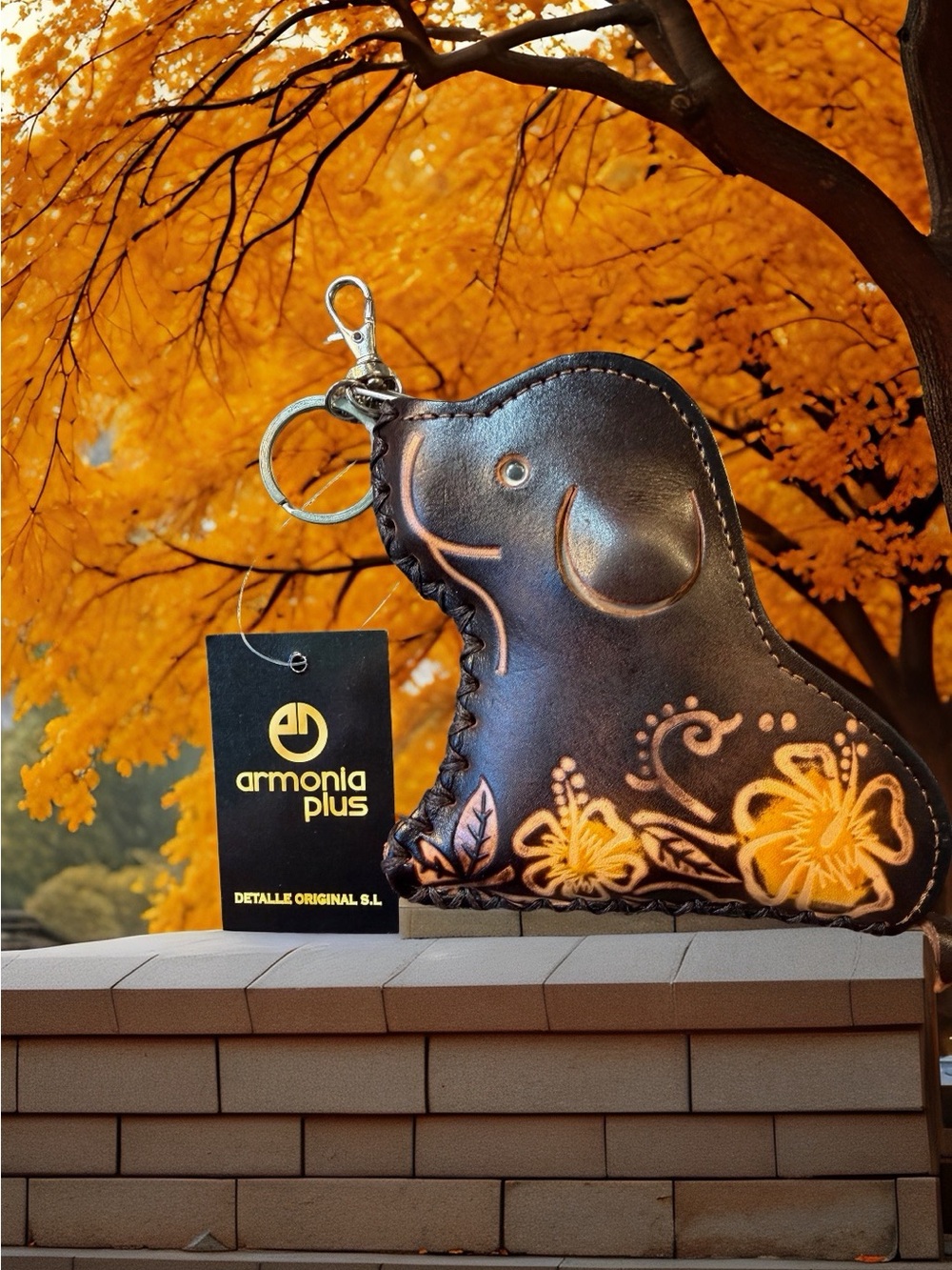 Hand-tooled dark brown leather elephant coin purse, floral & whipstitch details